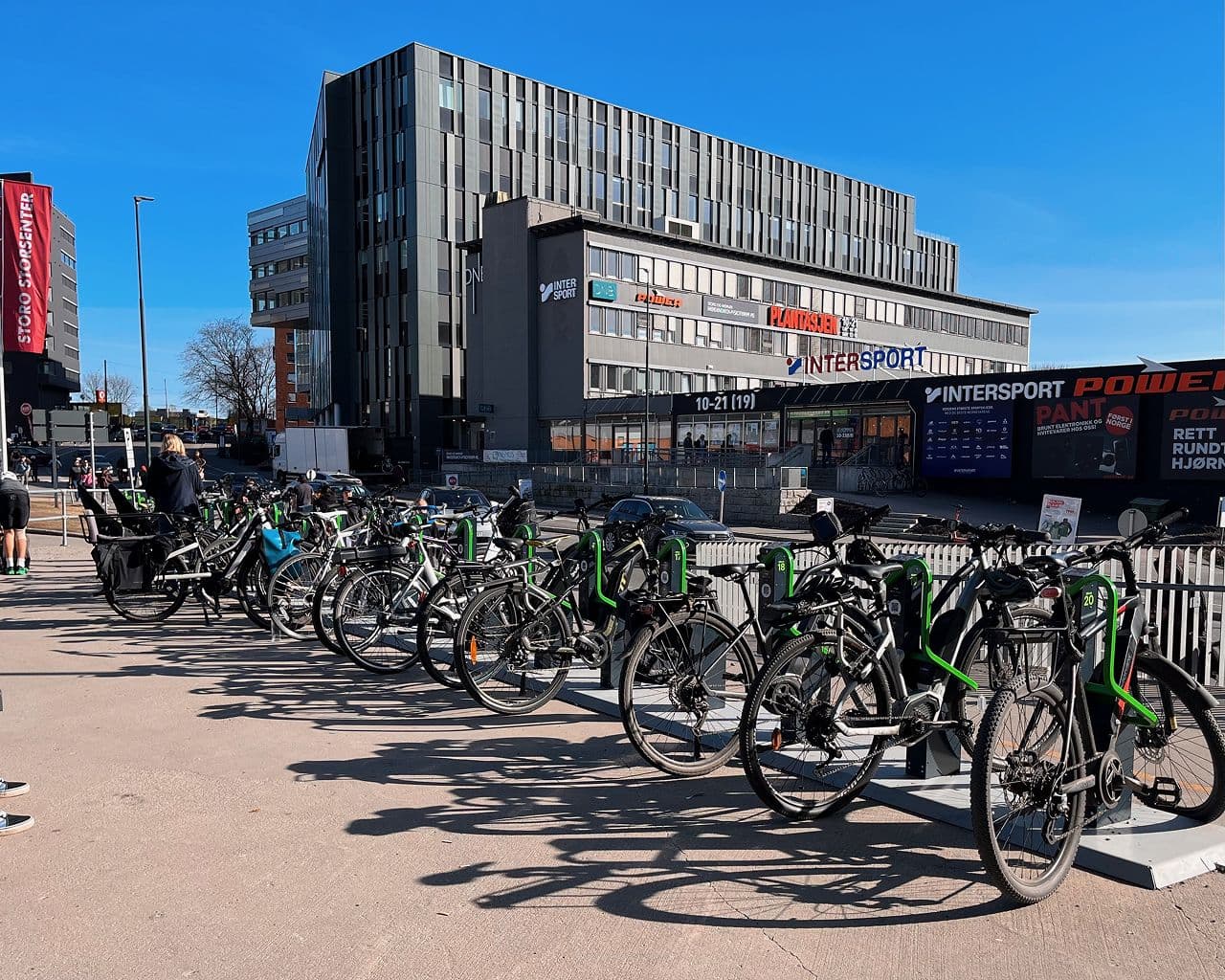 A 20-dock Bikeep station full of bikes at a city centre shopping centre