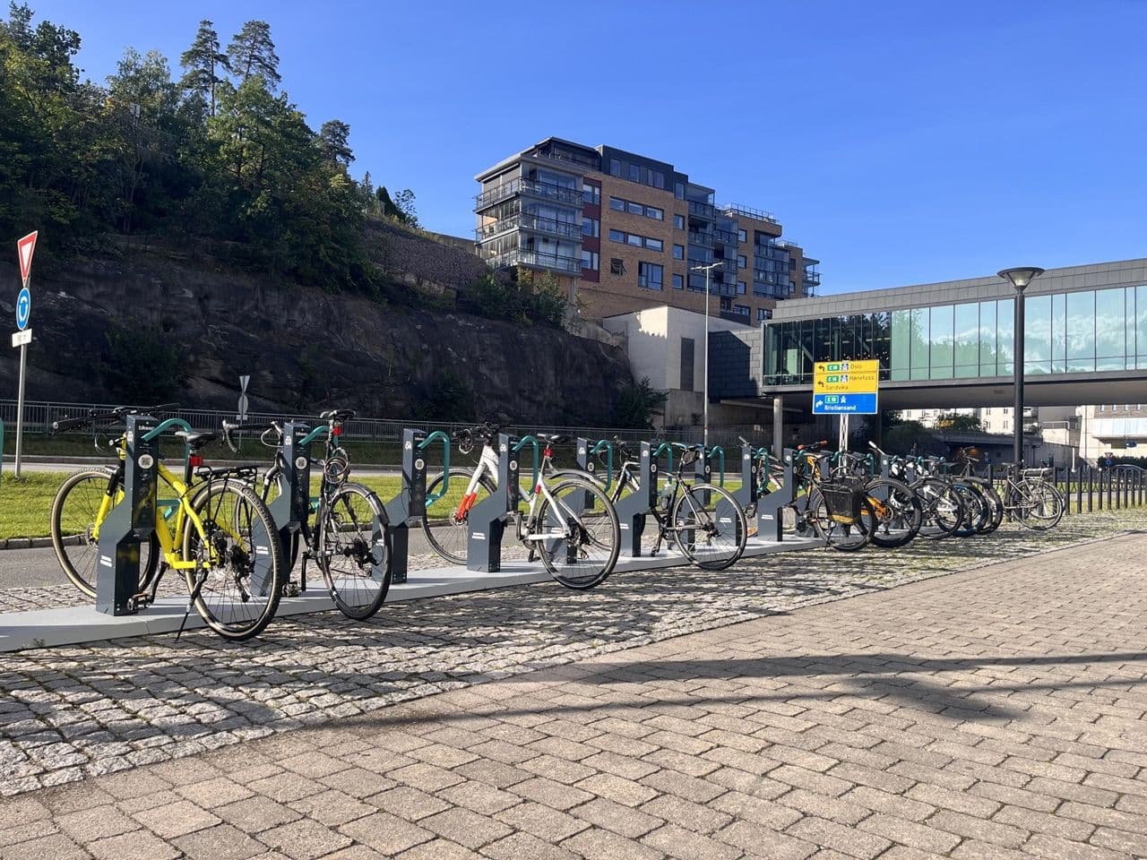 Bikeep station with ground plates full of bikes in city center